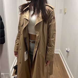 New coat Moncler. With tags . Selling because the size is to big for me, size XS